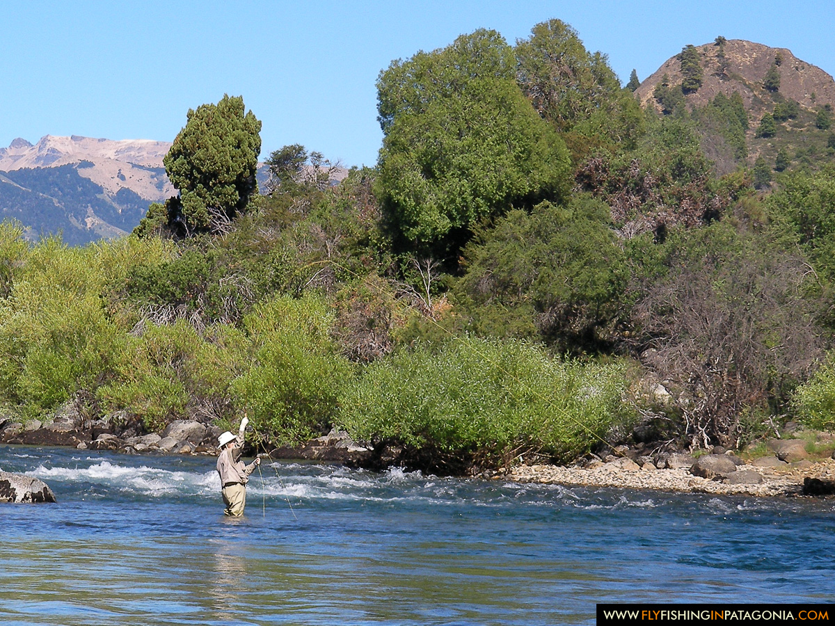 Angler fishing a broad scenic Traful River run