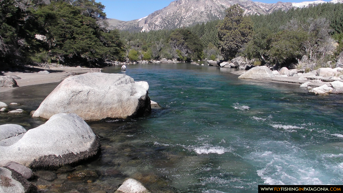 Turquoise Traful River flowing among large boulders