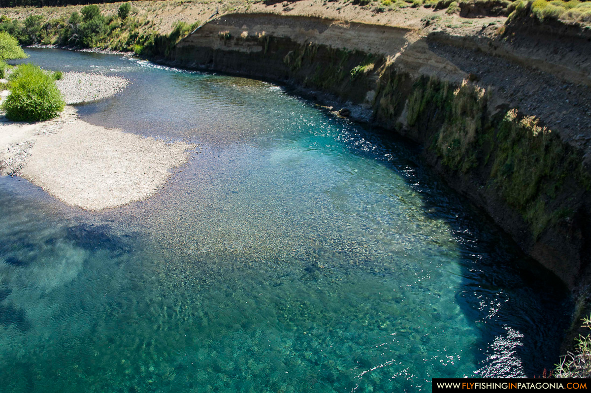 Aerial view of a turquoise bend in the Traful River